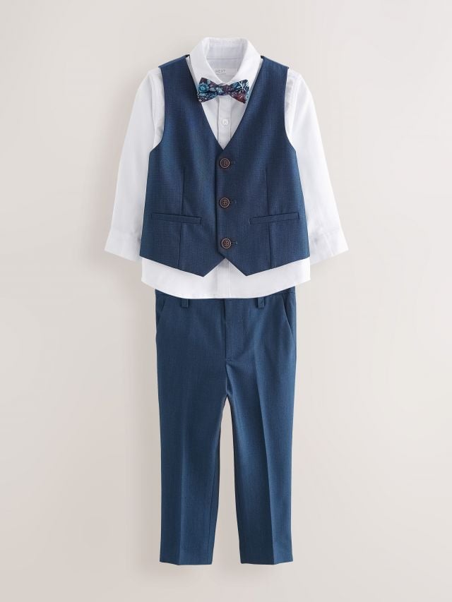 طقم أزرق مكوّن من صديري، قميص، بنطلون وربطة عنق