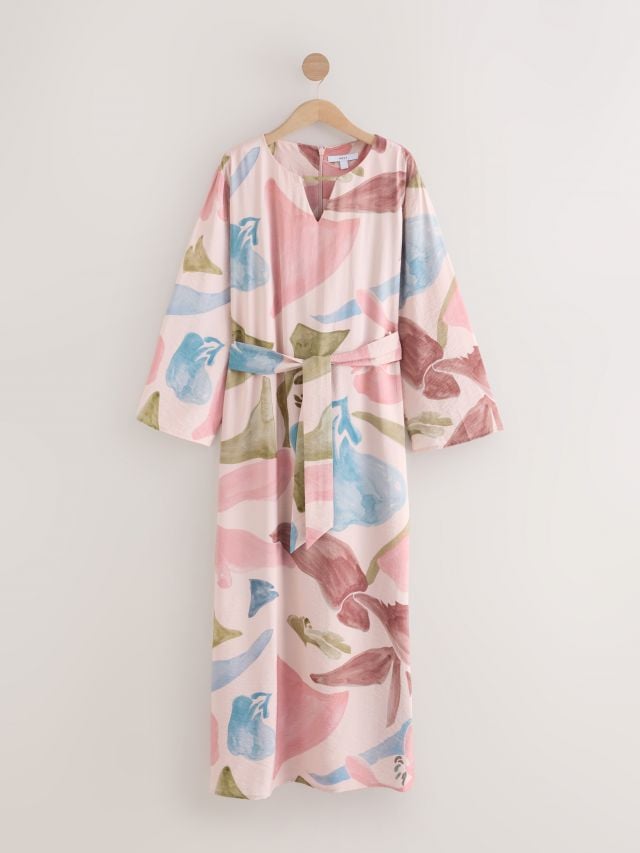 فستان كفتان ماكسي وردي بنقشة زهور وياقة V وأكمام طويلة