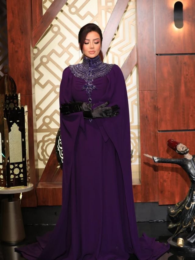 رضوى الشربيني بفستان بنفسجي فخم