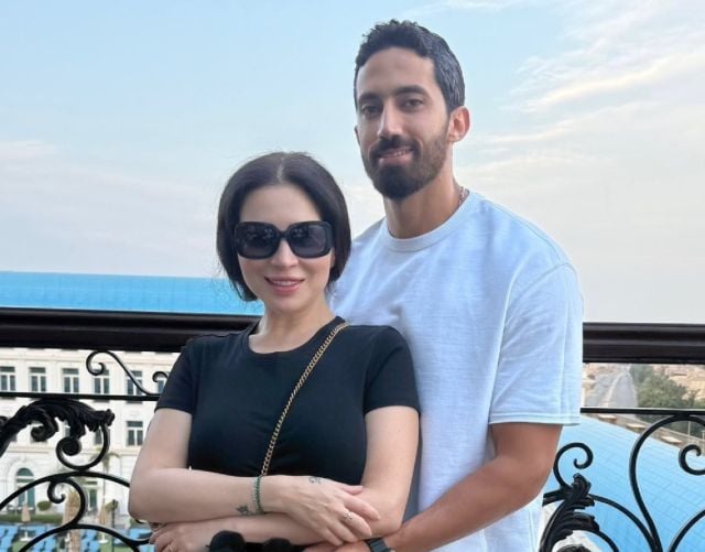 مي عز الدين وأحمد تيمور يستمتعان بهدوء بإجازة الصيف (صور)