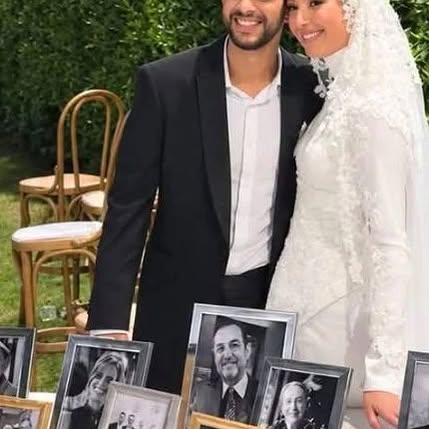 ابنة محمد مرزبان تزين زفافها بصور والدها