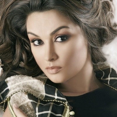 البوشي والمطربة المغربية حكمت