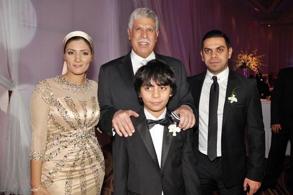 حسن شحاتة ونجله كريم وزوجته وحفيده