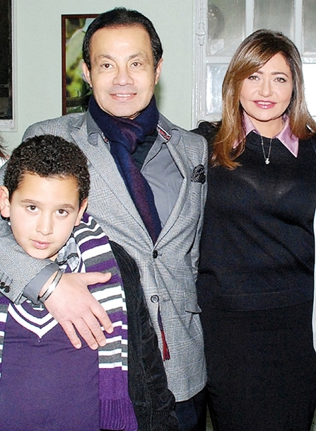 مع زوجها وابنها خالد