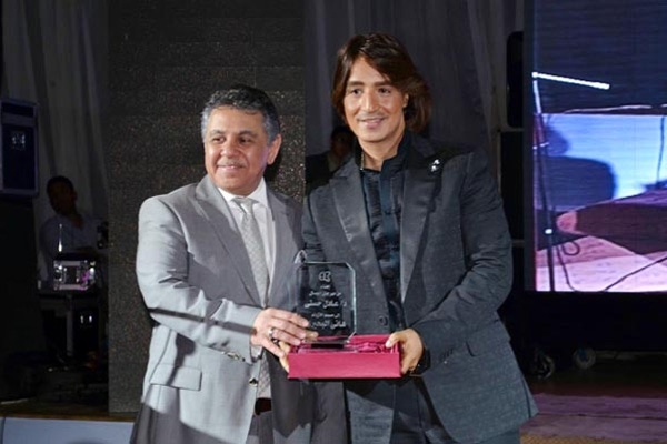  مصمم الأزياء هاني البحيري أثناء تكريمه