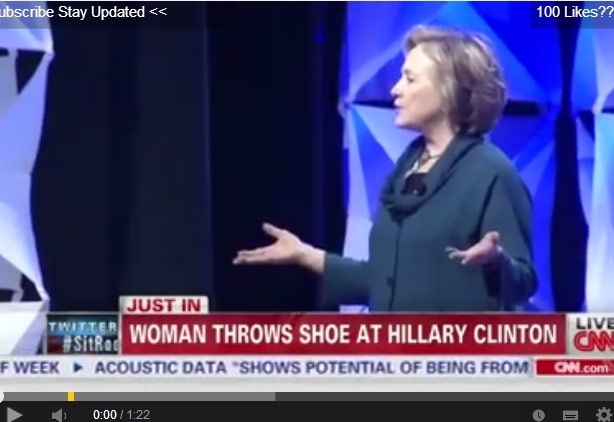 بالفيديو - امرأة تضرب هيلاري كلينتون بحذاء!