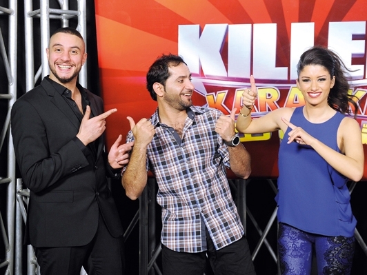 أحمد الفيشاوي وسينتيا خليفة يتلذذان بتعذيب المشاركين في برنامج Killer Karaoke 'غنِّ لو تقدر'