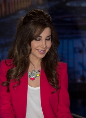 من هو الفنان الذي طلبت منه نانسي عجرم الاشتراك في اراب ايدول؟