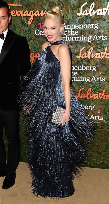 Gwen Stefani with Gold Metallic Quilted Clutch