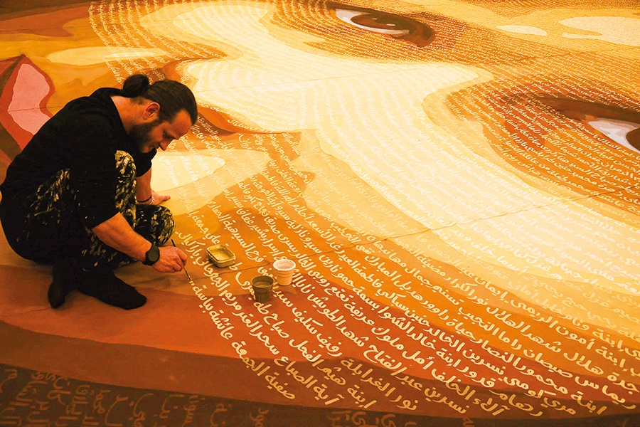 لوحة مساحتها ٤٥٠ متراً مربعاً تحمل أسماء ١٢٤٩٠ طفلاً سورياً سقطوا في الحرب