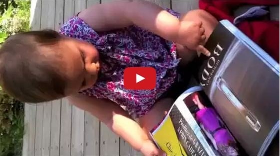 بالفيديو - 4 ملايين مشاهدة لطفلة تظن المجلة أيباد!