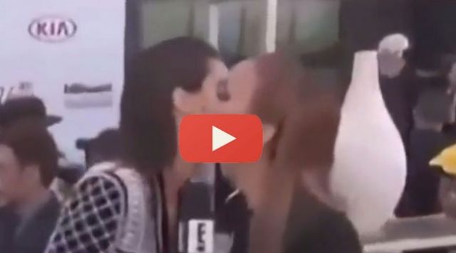 بالفيديو - قبلة تتسبب في إحراج بالغ لمذيعة