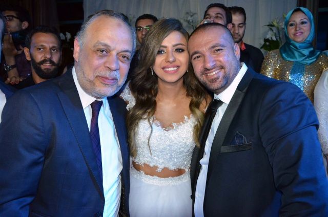 العروسان والدكتور أشرف زكي