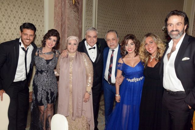 أيمن العزب وحرمه وروجينا وأشرف ذكي والنقلي وحرمه وأمل رزق وطارق صبري