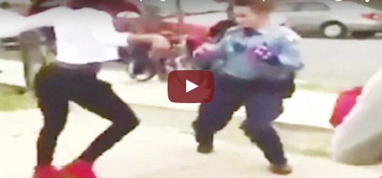 بالفيديو - شرطية تنهي عراكاً بالرقص على الشارع