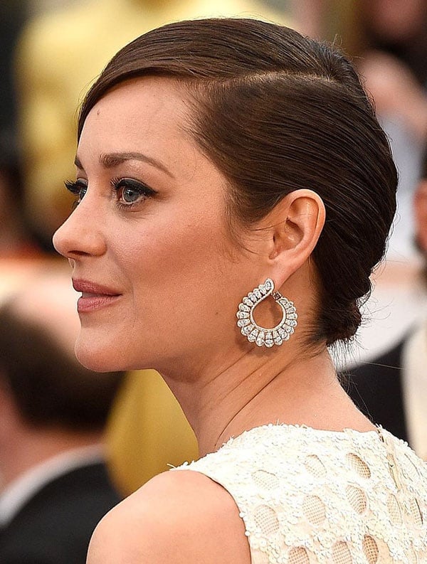 Marion Cotillard in diamond Chopard earrings