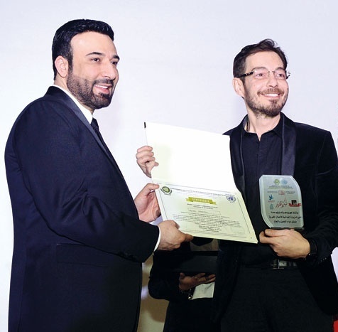 أحمد زاهر أثناء تكريمه
