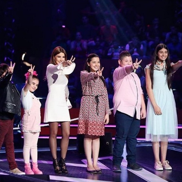 بالصور - مواجهة داخل The Voice Kids بين نانسي عجرم وإيمّيه صيّاح