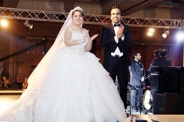 مي كساب والمصمم عمرو سعيد
