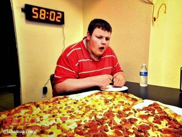 بالصور- تناولوا البيتزا واحصلوا على 2500 دولار... مسابقة فريدة من نوعها!