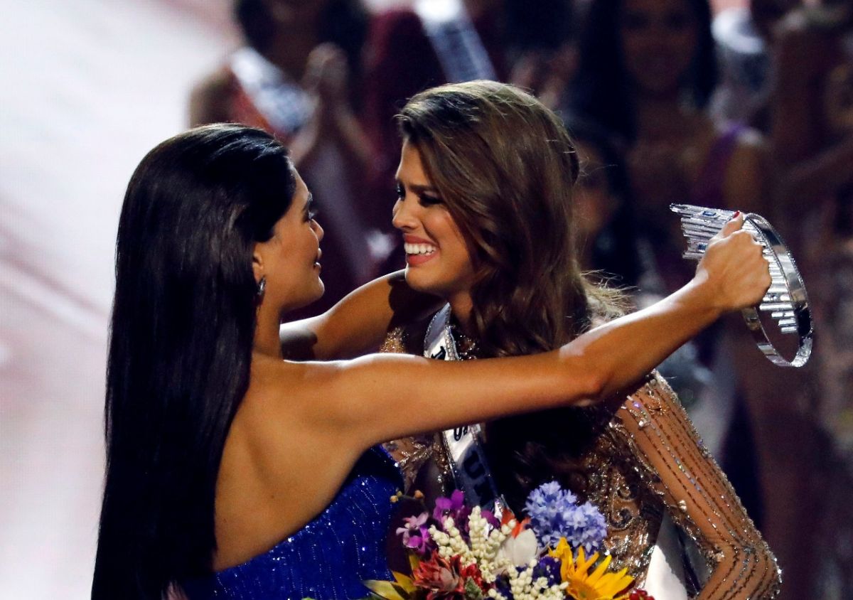 بالصور - لبنانية تمثل تنزانيا وسورية فنزويلا.. تعرفوا على ملكة جمال الكون!؟