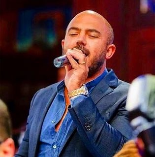 بالصور - الظهور الاول لمحمود العسيلي بعد وفاة والده