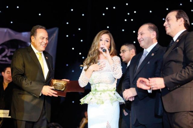  نيكول سعيدة بتكريمها
