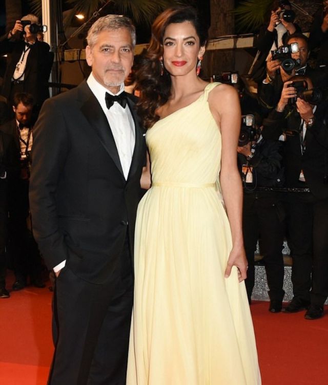 شاهدوا الصور الأولى لتوأم جورج وأمل كلوني... لاحظوا جمال شكلهما