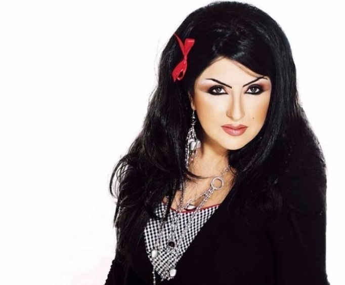 بالصور - شاهدوا كيف اصبحت زينب العسكري بعد 9 سنوات على اعتزالها وتعرفوا الى اطفالها... هل تحجبت؟!