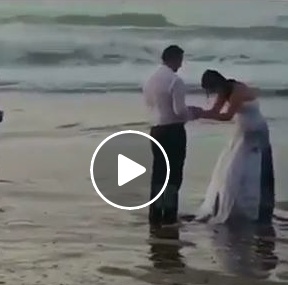 فيديو محرج - عروس تسقط في البحر بشكلٍ مروّع.. شاهدوا ردّة فعل العريس!