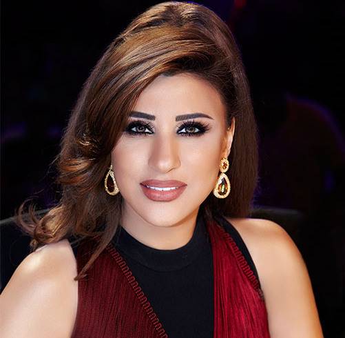 بالصورة - تحبس الأنفاس بفستانٍ أبيض.. شاهدوا أناقتها