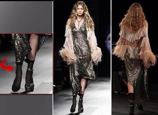 بالفيديو جيجي حديد تتعرض لموقف حرج أثناء عرض Anna Sui ... وهذا ما فعلته
